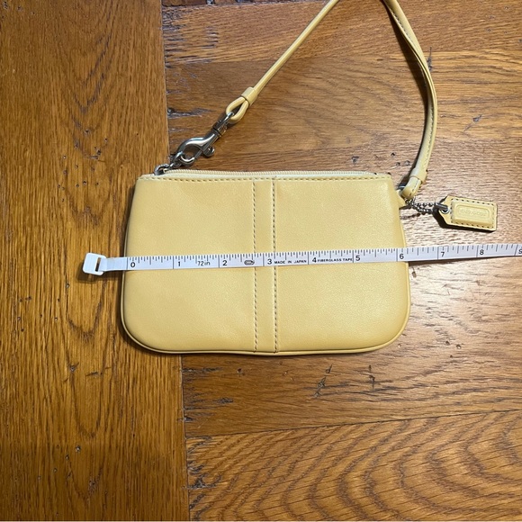Coach NWOT butter yellow Leather Wristlet, Smokefree home. - Picture 2 of 8